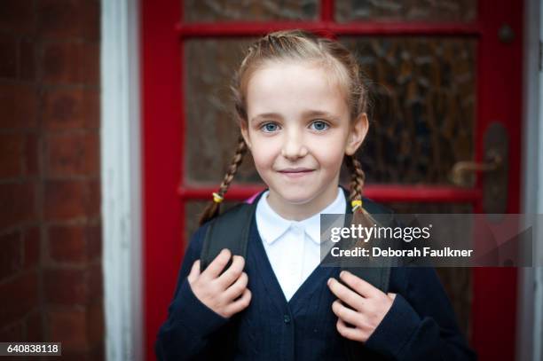 7 year old girl in school uniform - nottinghamshire stock pictures, royalty-free photos & images