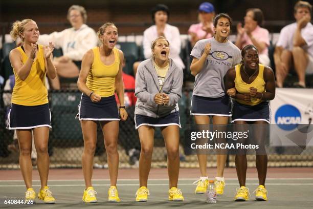 The Georgia Tech University bench cheers on Alison Silverio as she takes on Tracy Lin of UCLA during the Division I Women's Tennis Championship held...