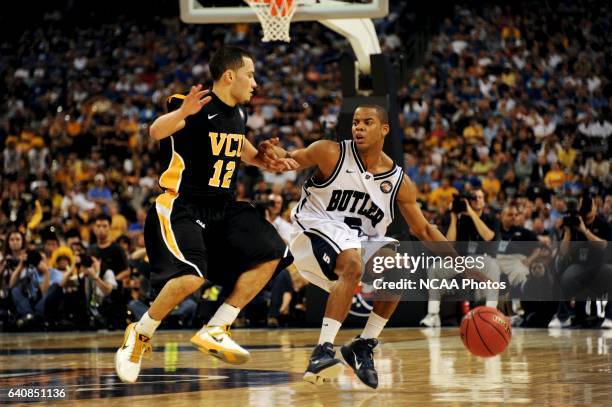 Ronald Nored of Butler University battles Joey Rodriguez of Virginia Commonwealth University during the semifinal game of the 2011 NCAA Photos via...