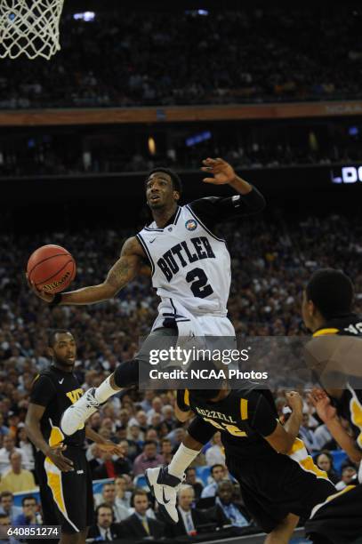 Shawn Vanzant of Butler University puts the ball up past Brandon Rozzell of Virginia Commonwealth University during the 2011 NCAA Photos via Getty...