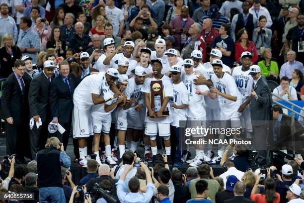 University of Connecticut teammates celebrate their championship following the final game of the 2011 NCAA Photos via Getty Images Final Four...
