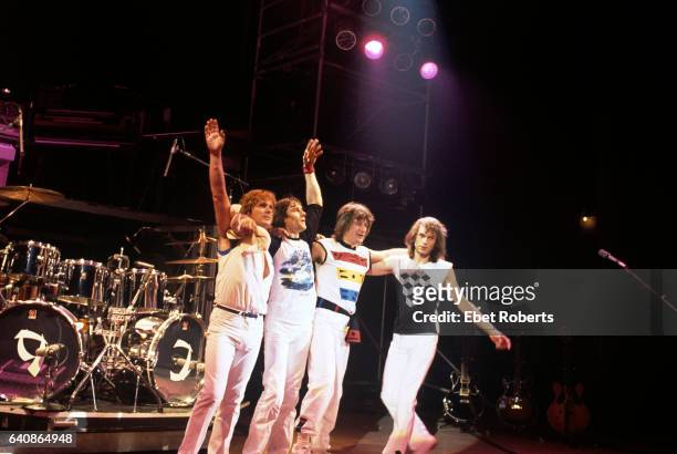 British rock group Asia wave goodbye after performing at the Palladium in New York City on May 2, 1982. John Wetton, Carl Palmer, Geoff Downes, Steve...