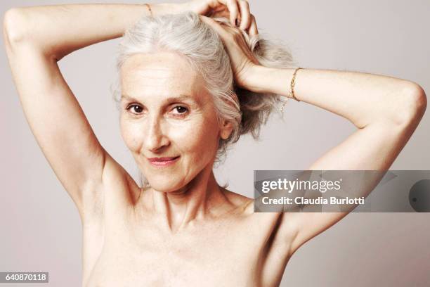 woman looking young - mature women stock pictures, royalty-free photos & images