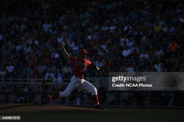 Kevin Ginkel of University of Arizona delivers a pitch against Coastal Carolina University during the Division I Men's Baseball Championship held at...