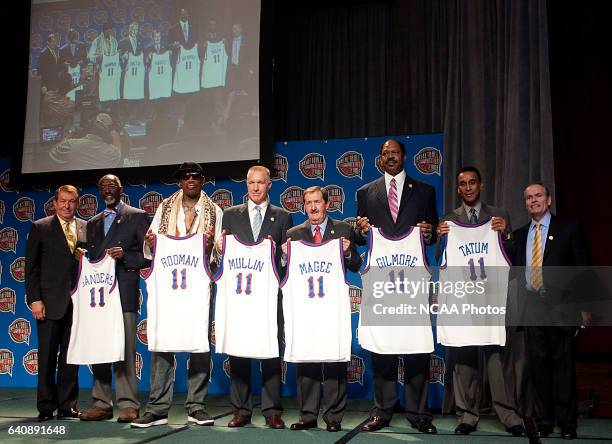 Jerry Colangelo, Chairman of the Naismith Basketball Hall of Fame board, far left, and John L. Doleva, President and CEO, far right, flank Naismith...