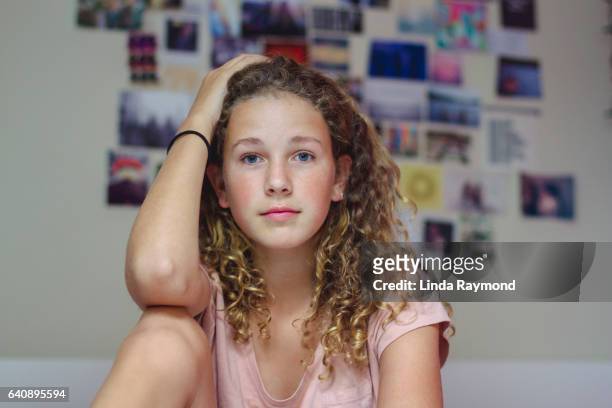 Portrait of a beautiful teenager in her bedroom
