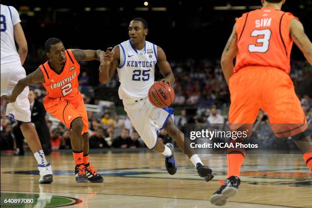 Guard Marquis Teague from the University of Kentucky drives to the basket past Russ Smith from the University of Louisville during the Semifinal Game...