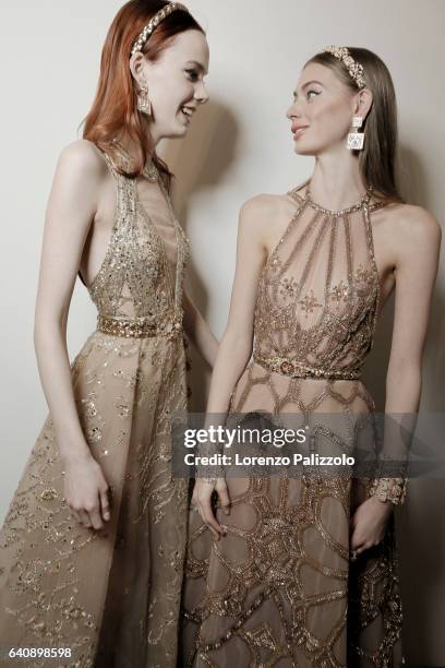 Models Kiki Willems and Lauren de Graaf pose Backstage prior the Elie Saab Fashion Week on January 25, 2017 in Paris, France.