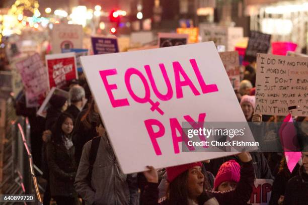 View of a demonstrator as she holds a sign on Fifth Avenue during the Women's March on New York, New York, New York, January 21, 2017. Her sign reads...