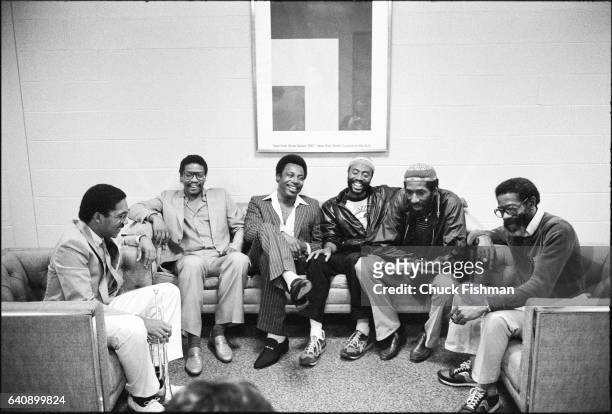 Backstage at the Kool Jazz Festival, musicians Wynton Marsalis, Herbie Hancock, George Benson, Bobby McFerrin, Ron Carter, and Joe Henderson share a...