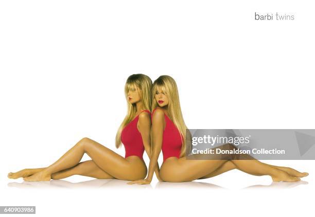 Shane Barbi and Sia Barbi of the Barbi Twins pose for a portrait session in circa 2000 in Los Angeles, California.