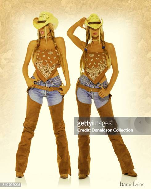 Shane Barbi and Sia Barbi of the Barbi Twins pose for a portrait session in circa 2000 in Los Angeles, California.