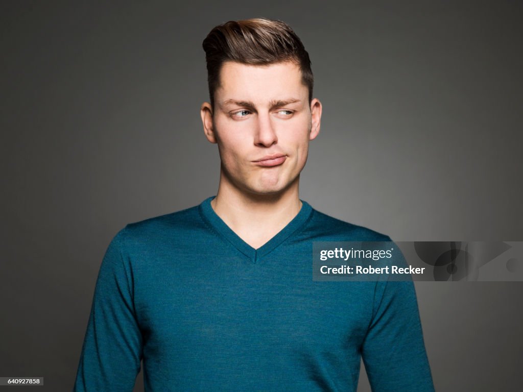 Suspicious young man