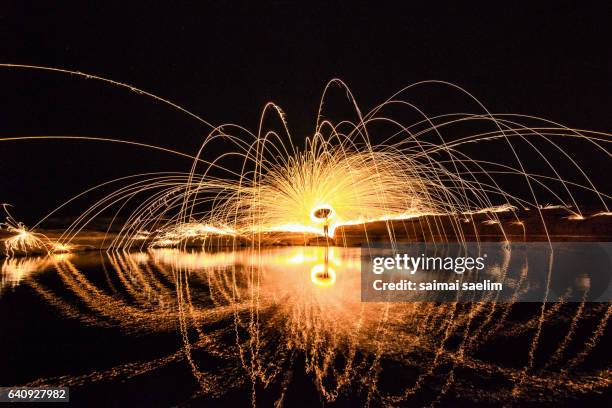 burning steel wool fireworks, the grand canyon  of thailand  (3000 bok) - burning steel wool firework stock pictures, royalty-free photos & images