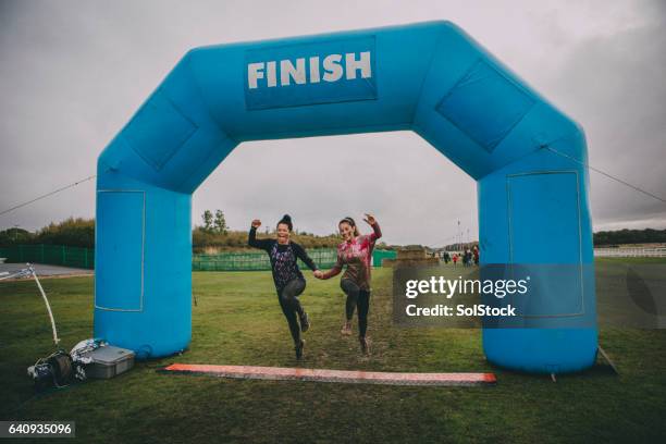 happy winners - running race stock pictures, royalty-free photos & images