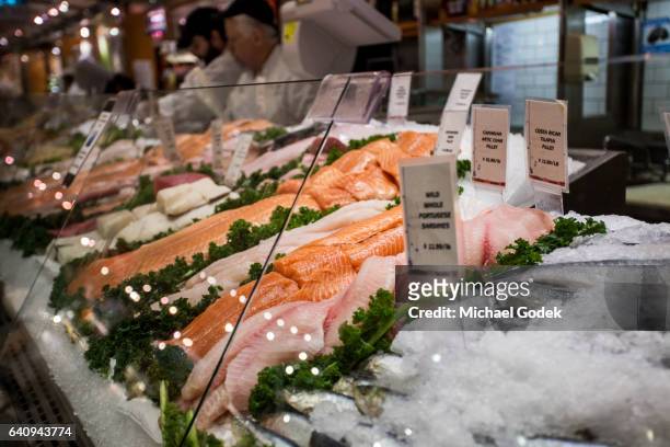 display of fresh fish for sale at local market in grand central station - fish market stockfoto's en -beelden