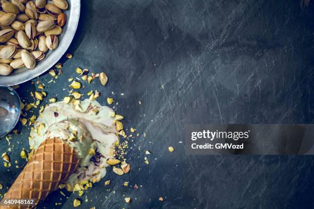 pistachio ice cream on a background - pistachio ice cream stock pictures, royalty-free photos & images