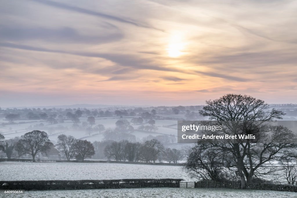 Atmospheric mist covers the valley floor in rural North Yorkshire