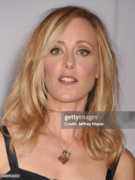 Actress Kim Raver arrives at the Premiere Of Columbia Pictures' 'Passengers' at Regency Village Theatre on December 14, 2016 in Westwood, California.