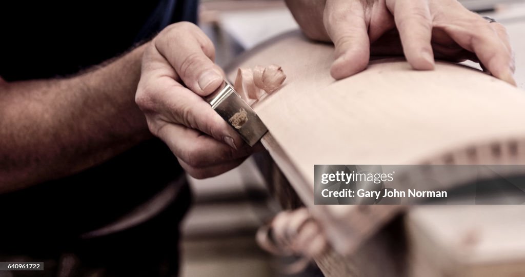 Craftsperson using hand tools, close up