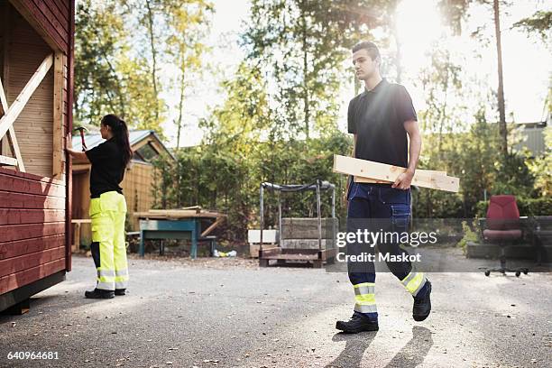 carpentry students working at site - moving train hits students stock pictures, royalty-free photos & images