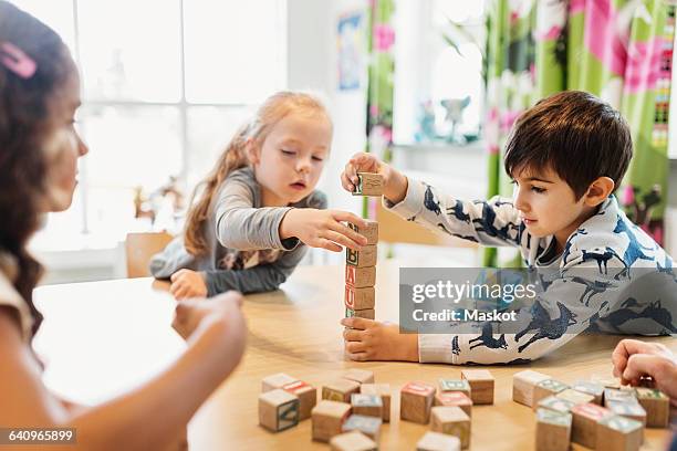 1,535 Child Stacking Blocks Stock Photos, High-Res Pictures, and Images ...
