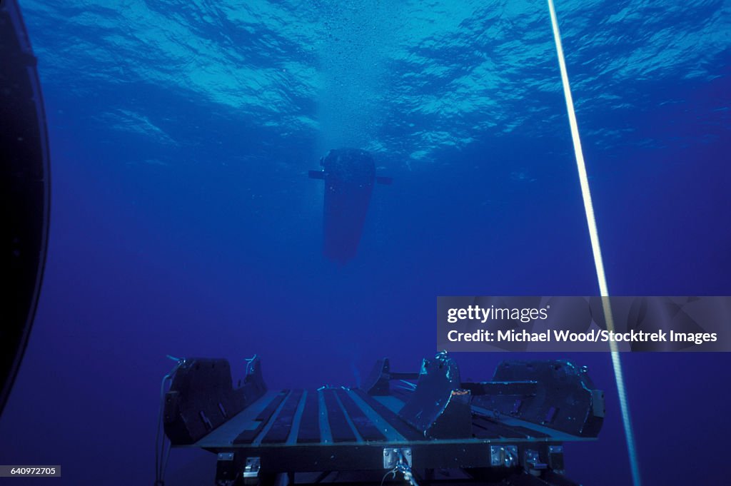 A SEAL Delivery Vehicle approaches the Dry Deck Shelter.