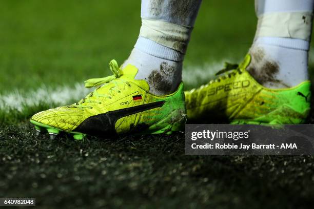 German flag on the Puma football boots of Chris Lowe of Huddersfield Town during the Sky Bet Championship match between Huddersfield Town and...