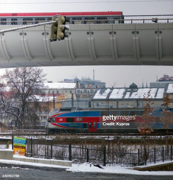 europe, czech republic, prague, view of passenger trains crossing bridge - prague train stock pictures, royalty-free photos & images