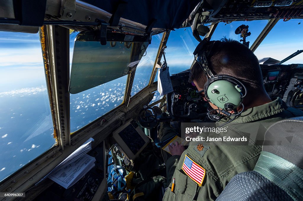 The flight crew of a US Air force Hercules flying to New Zealand from Antarctica.
