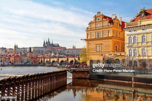 smetana quay with vltava river, charles bridge, hradcany castle and st. vitus cathedral, prague, central bohemia, czech republic - charles bridge stock pictures, royalty-free photos & images