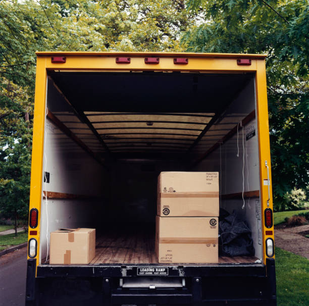 Where to Buy Moving Boxes in South Africa? 3 boxes in back of moving van