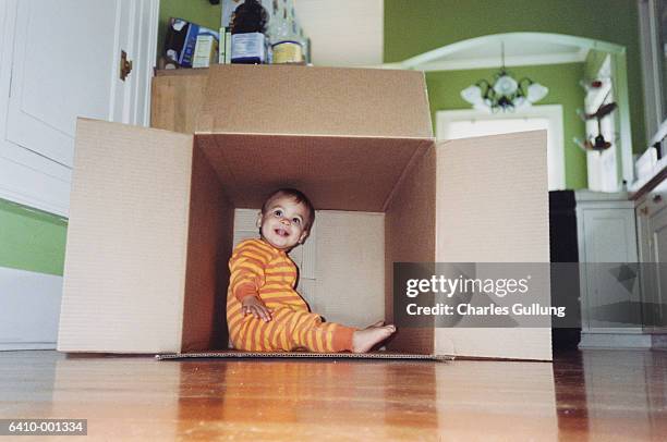 Baby Is Box Baby In A Box Photos and Premium High Res Pictures - Getty Images