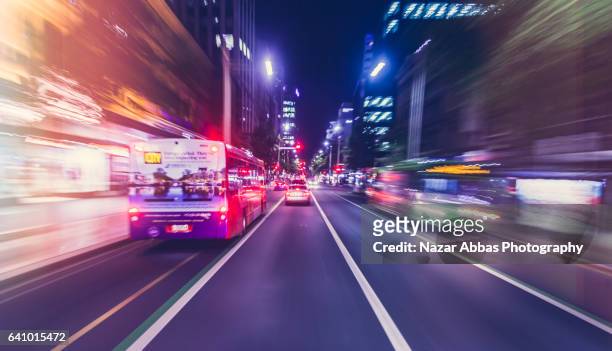 driving through city. - timelapse new zealand stock pictures, royalty-free photos & images