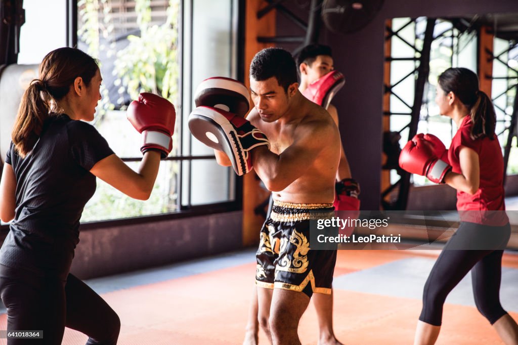 Muay Thai workout - Motivational training at the gym facility