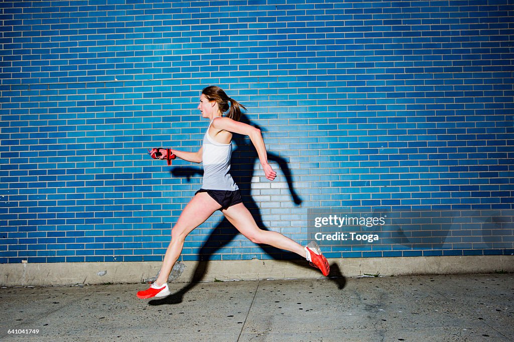 Female running on city streets