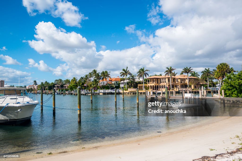 Boca Raton marina with yacht and residential buildings, USA