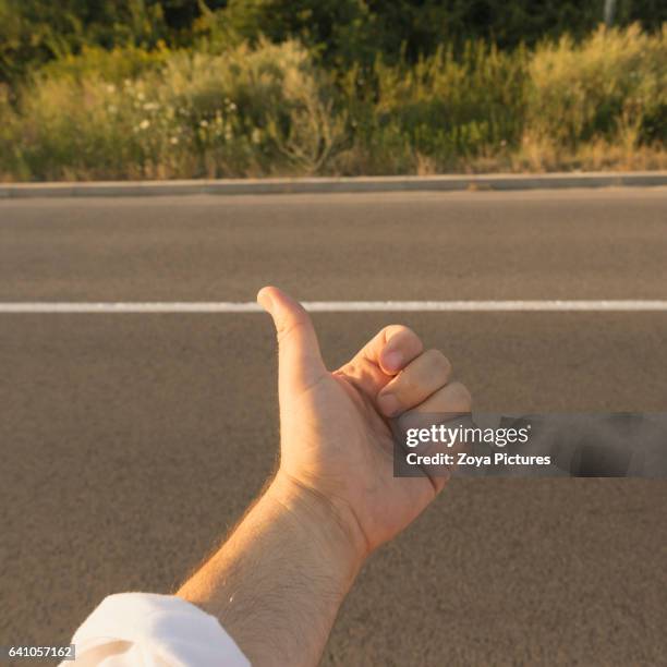 409 Hitchhikers Thumb Stock Photos, High-Res Pictures, and Images ...