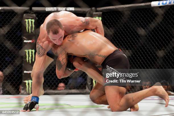 James Vick fights for position against Abel Trujillo in the Lightweight Bout during UFC Fight Night at the Toyota Center on February 4, 2017 in...