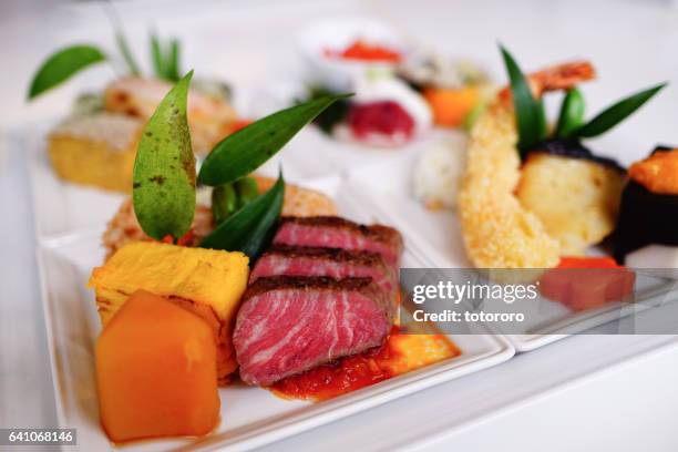 wagyu beef (和牛)(japanese cow) and kaiseki (懐石) cuisine plates - 和牛 stock pictures, royalty-free photos & images