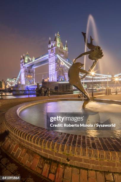 the girl with a dolphin fountain by the artist david wynne - 19 century town girl stock pictures, royalty-free photos & images