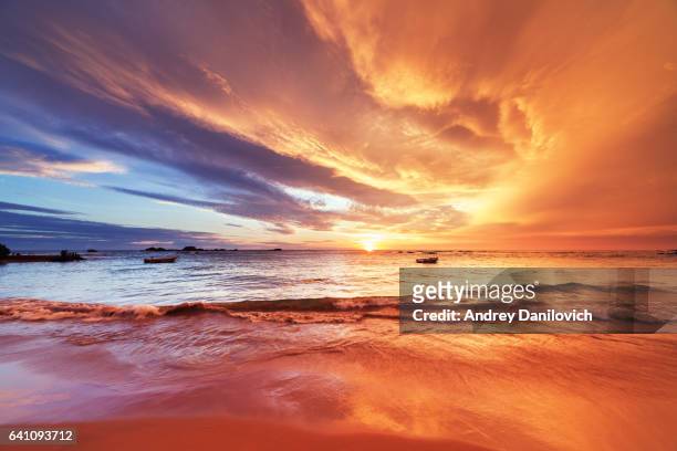 sunset over indian ocean - beauty in nature stock pictures, royalty-free photos & images