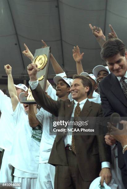 Michigan State head coach Tom Izzo and his team celebrate winning the NCAA Photos via Getty Images Division I Men's Basketball Final Four...