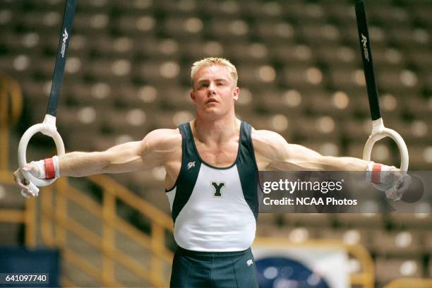 Courtney Bramwell of Brigham Young University competes in the Still Rings during the 2000 NCAA Photos via Getty Images Men's Division I Gymnastics...