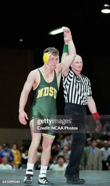 Todd Fuller of North Dakota State University defeated Mike Mitchell of American Intl College for the championship title by a 10-4 decision in the 174...