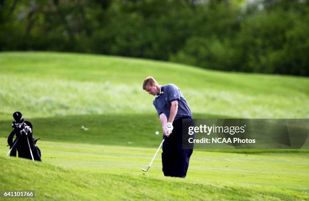 Andy Smith of the University of Wisconsin-Eau Claire hits an approach shot during the Division 3 Men's Golf Championship held at the Firethorn Golf...