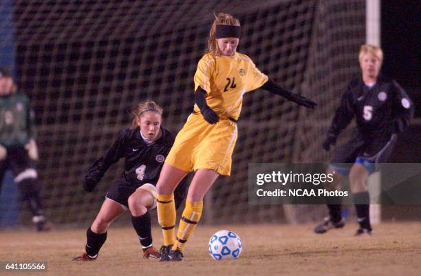 Jesse Fream of Kennesaw State controls the ball as Franklin Pierce's Kristen Lake plays defense during the Division 2 Women's Soccer Championship...