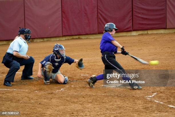 Shortstop Michelle Wong of the University of St. Thomas picks up a single against Moravian College during the Division III Women's Softball...