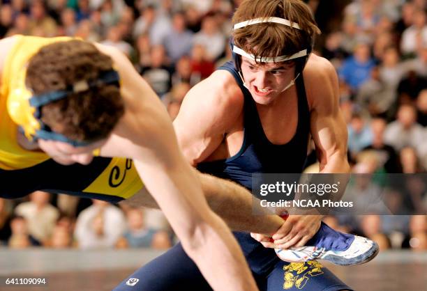 Aaron Graumann of Augustana College wrestles Ryon Mazzocco of the University of Pittsburgh at Johnstown during the Division 2 Wrestling Championships...