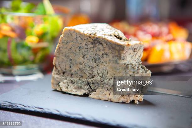 cabrales cheese in black background - blue cheese stock pictures, royalty-free photos & images